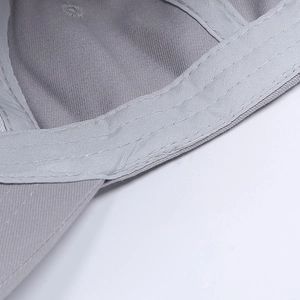 Detailed macro view of gray baseball cap interior showing fabric texture and neat stitching