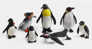 Detailed set of 7 realistic penguin animal figurines showing various lifelike poses