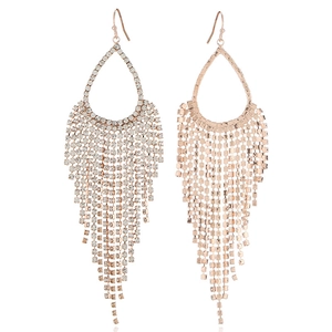 Detailed view of rose gold teardrop tassel earrings with sparkling rhinestone chains