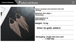 Close-up of tassel rhinestone drop earrings with KC gold and white K plating details