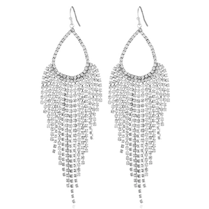 Close-up of silver teardrop tassel earrings with rhinestone claw chains and full diamonds