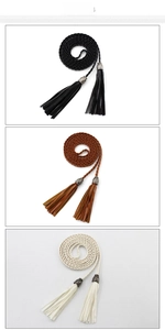 Detailed view of woven waist belts with vintage metal tassels in black brown and cream