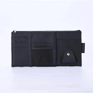 Detail of black PU leather car sun visor organizer with mesh pocket and zipper