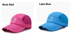 Detail view of mesh baseball caps in rose red and lake blue with TC OUTDOORS logo