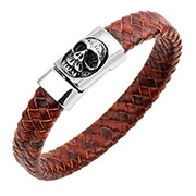 Detail of red brown braided leather bracelet with silver skull magnetic clasp
