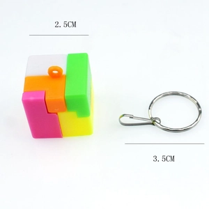 Detail view of colorful puzzle cube keychain with 2.5cm height and 3.5cm key ring