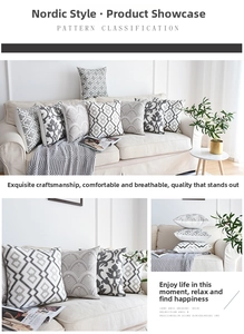 Détails des motifs brodés géométriques nordiques et coutures fines sur les housses de coussin