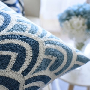 Classic Chinese blue and white embroidery cushion cover with geometric wave pattern on sofa