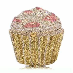 Detailed macro shot of a cupcake-shaped crystal clutch bag with red lip patterns