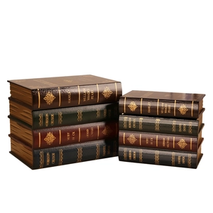 Set of vintage faux book storage boxes featuring classic literary titles in gold foil
