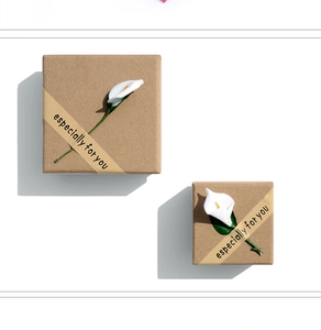 Minimalist kraft paper gift boxes with white calla lily and Especially For You band
