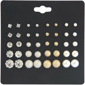Assorted pearl and cubic zirconia stud earrings set displayed on black jewelry card