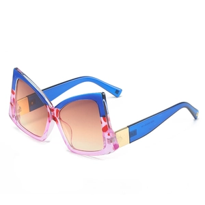 Stylish oversized butterfly shaped sunglasses with blue and pink leopard frame and gradient lenses
