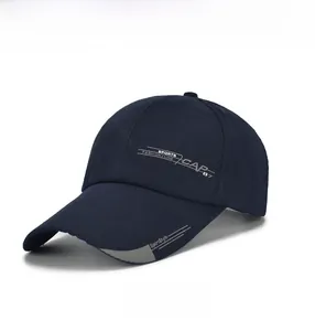 Detail of dark blue cotton canvas baseball cap featuring sports fashion embroidery
