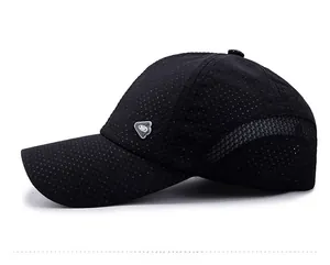 Close-up of black breathable mesh baseball cap with laser-perforated side and logo