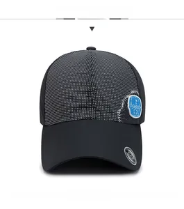 Detail of quick-dry baseball cap with mesh texture and blue High Tech rubber badge