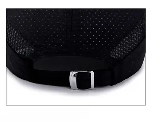 Detail of adjustable metal buckle and breathable honeycomb mesh on a black baseball cap