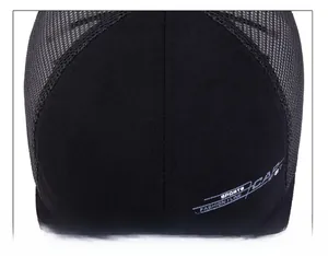 Detail of meticulous top stitching and breathable mesh texture on a black sports trucker hat