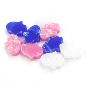 Detail of 1.8mm resin Hamsa Fatima beads in pink, blue and white with glitter finish