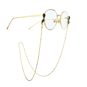 Minimalist gold round frame glasses featuring a chic beaded metal decorative chain