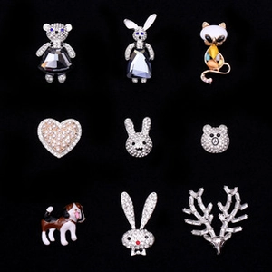 Nine crystal animal brooches featuring bear, bunny and cat charms for DIY crafts