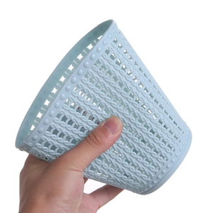 Light blue hollow plastic desktop storage bin with woven texture for home and office