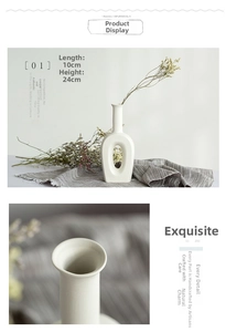 Detail view of a white ceramic vase with a matte finish and oval hollow-out design