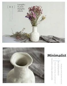 Detail view of matte white ceramic vase showing textured surface and 20cm height