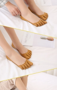 Close-up of minimalist brown low-cut five-finger socks in soft cotton fabric