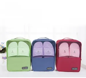 Three-position travel shoe bag in waterproof cationic oxford cloth with breathable mesh detail