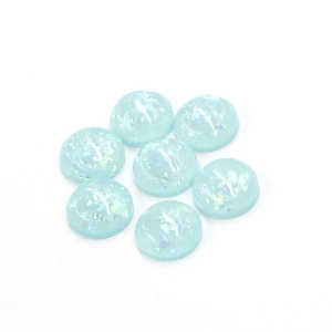 Detail of 12mm light blue oval synthetic opal resin stones with glitter foil effect