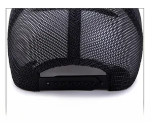 Close-up of black mesh baseball cap with adjustable plastic snapback strap details