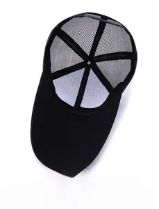 Detail view of the black trucker hat inner lining showing breathable mesh and sweatband