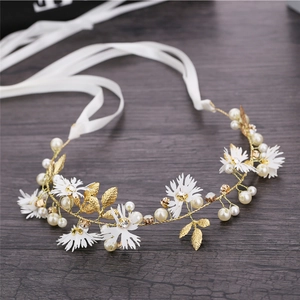 Handmade bridal headband with white daisy flowers, pearls, and crystals on gold wire
