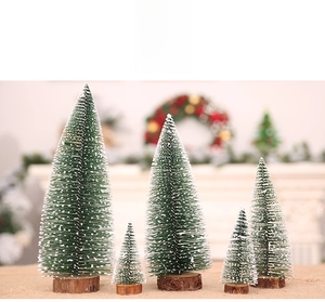 Set of 5 snowy mini Christmas trees with wooden bases for tabletop holiday decor