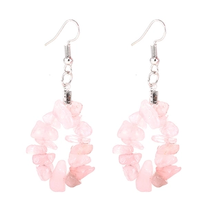 Detailed view of pink quartz chip stone hoop earrings with silver fish hook clasps