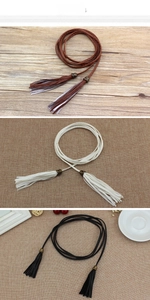Detail of woven PU leather waist belts with metal clasps and long tassels in three colors