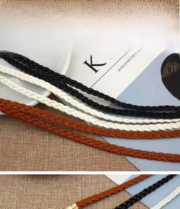 Detailed view of woven waist belts in black, white, and brown for summer dresses