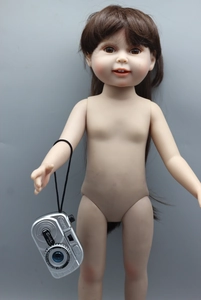 Detail of 18-inch doll with brown hair holding a silver toy camera accessory with lanyard
