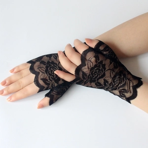 Detailed view of black lace fingerless gloves with intricate rose floral patterns