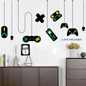 Gamer wall decal featuring game controllers and I LOVE THE GAMES text for gaming room decor