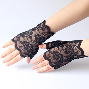 Close-up of black lace fingerless gloves with elegant rose pattern for sun protection