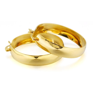 Polished chunky gold hoop earrings with hinge clasp on white background for women
