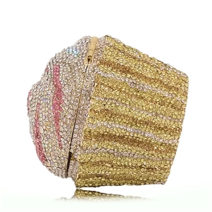 Detailed side view of cupcake clutch evening bag with gold base and silver rhinestones