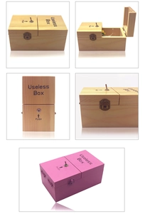 Detailed views of wooden and pink Useless Box featuring mechanical arm and toggle switch