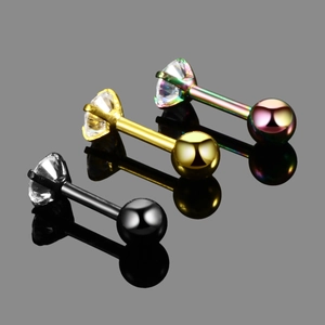 Detail of round cubic zirconia studs in black gold and rainbow surgical steel