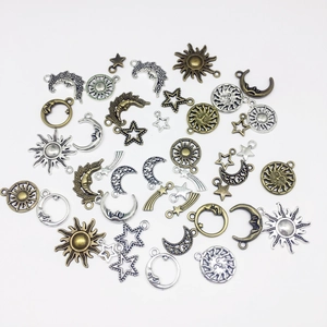 Mix of antique bronze and silver hollow star moon sun metal charms for jewelry making