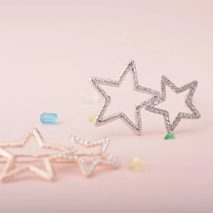 Chic silver alloy star hair clip with textured metal and sparkling rhinestone accents