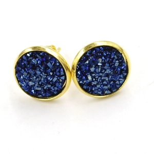 Detail view of 12mm gold plated round studs with dark blue druzy resin inlay