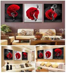 Detailed living room wall art set featuring three canvas prints of a woman in a red dress